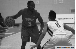 York guard Richard Iheadindu looks for an open teammate.